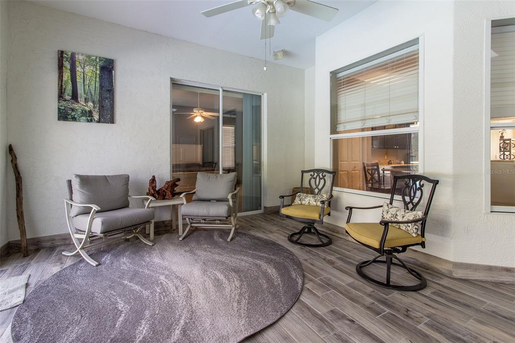 8950 Southeast 17th Court Ocala, FL 34480 - Photo 41 of 61 a living room with furniture and a window
