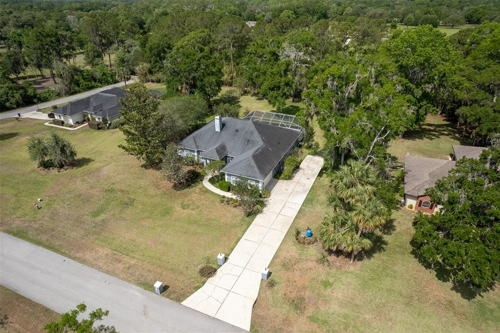 8950 Southeast 17th Court Ocala, FL 34480 - Photo 52 of 61 an aerial view of residential house with outdoor space