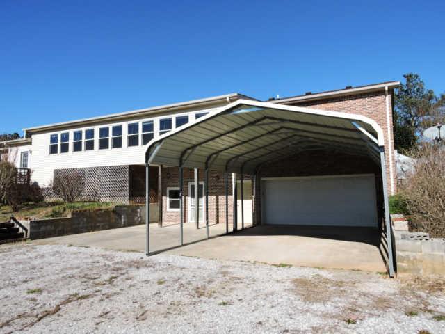 1406 Mud Creek Road Morrison, TN 37357 - Photo 19 of 20 a view of a house with a yard