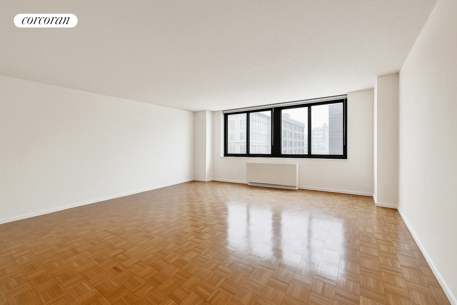 376 Broadway, Unit 9G Manhattan, NY 10013 - Photo 1 of 1 a view of empty room with wooden floor and fan
