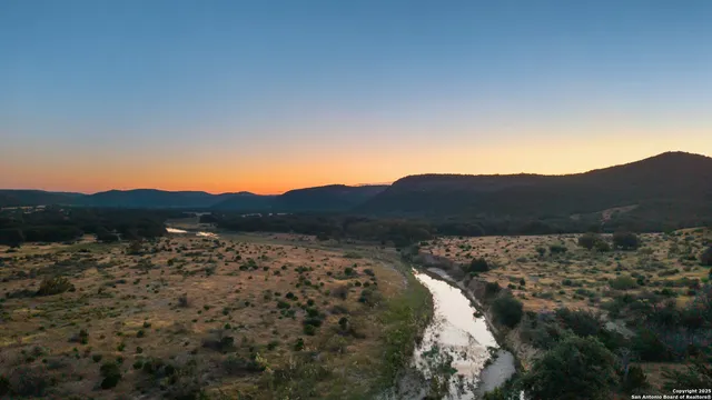 a view of lake with mountain