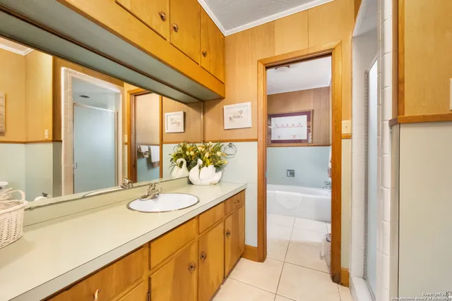 a view of a chairs and table in the balcony