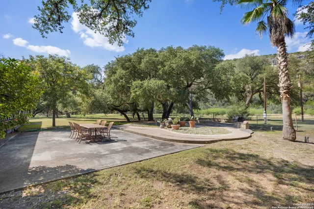 a view of mountain view with lots of trees