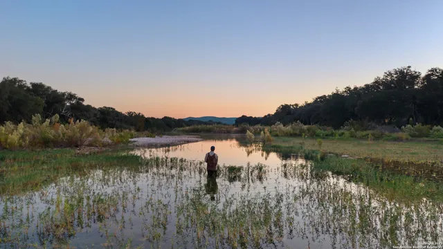 a view of lake with mountain