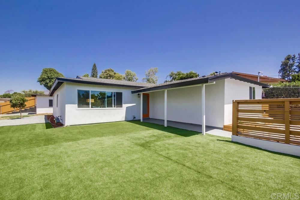 415 Felicita Avenue Spring Valley, CA 91977 - Photo 1 of 1 a front view of a house with a garden and yard