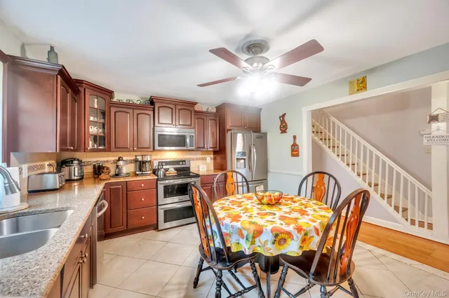 a view of a dining room with furniture
