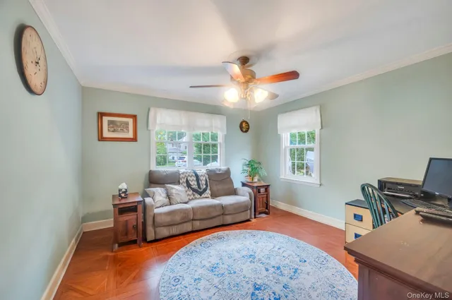 a living room with furniture and a window