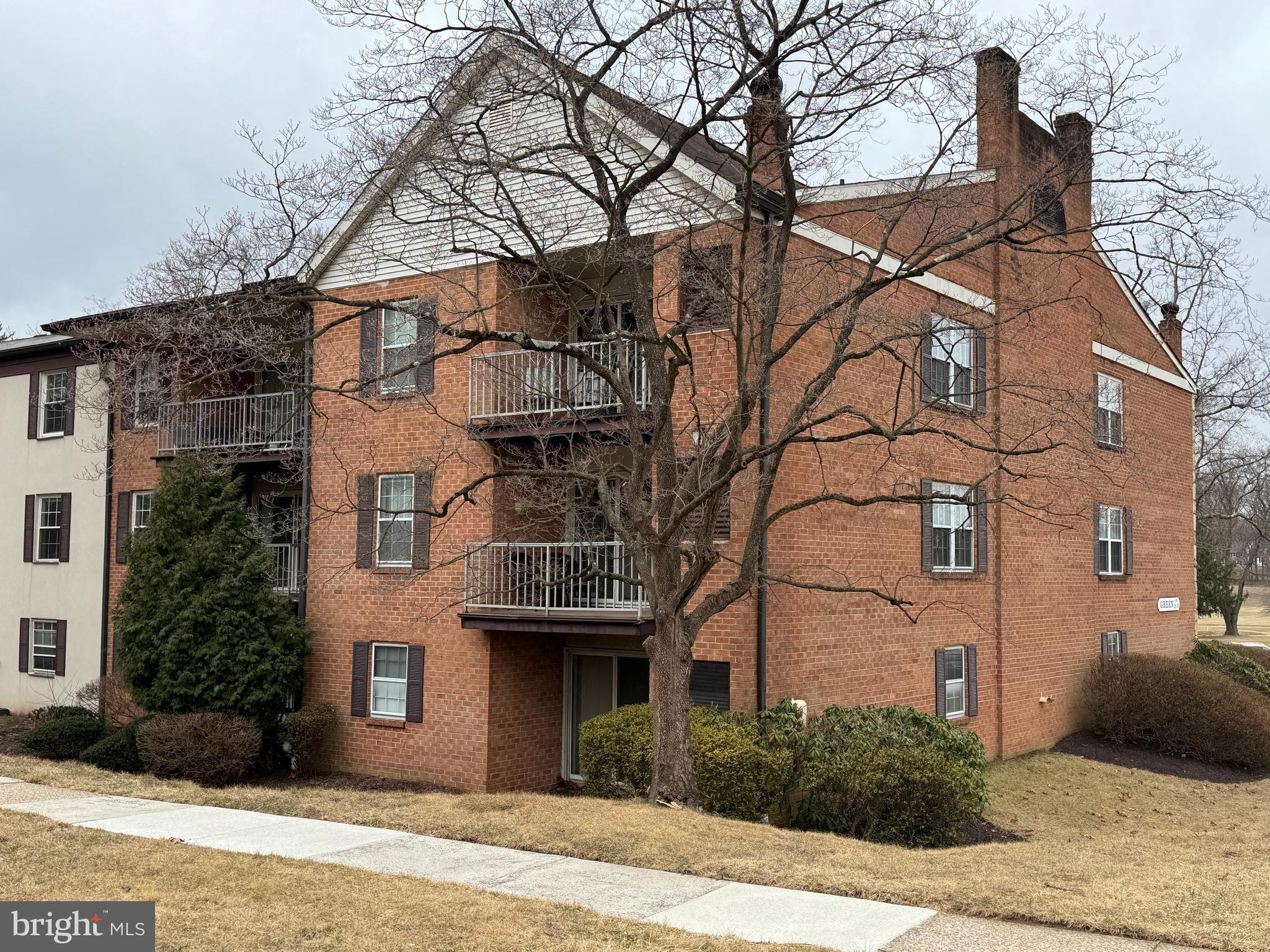 307 Drummers Lane Wayne, PA 19087 - Photo 14 of 16 a house that has a tree in front of it