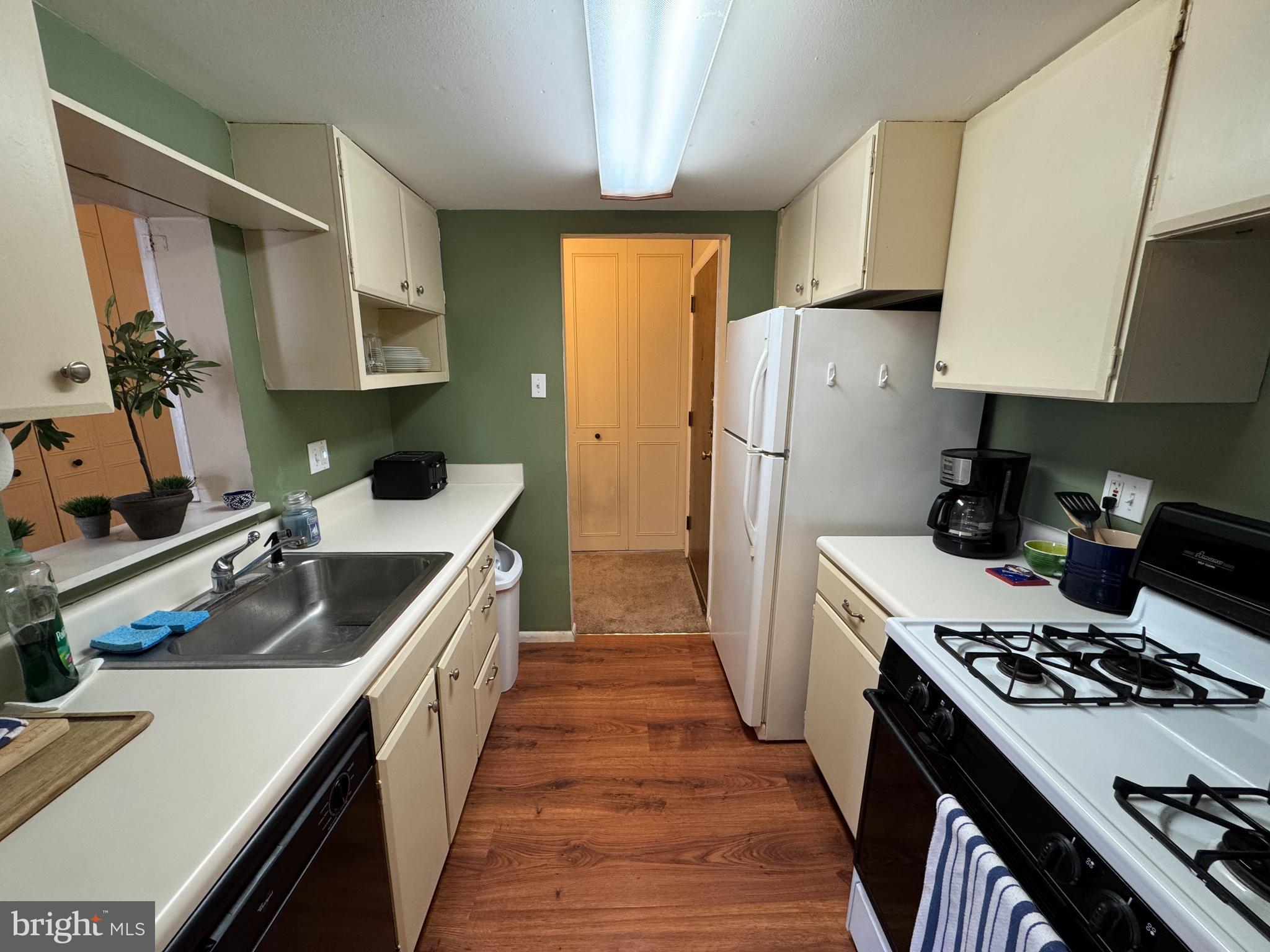 307 Drummers Lane Wayne, PA 19087 - Photo 5 of 16 a kitchen with a sink stove and refrigerator