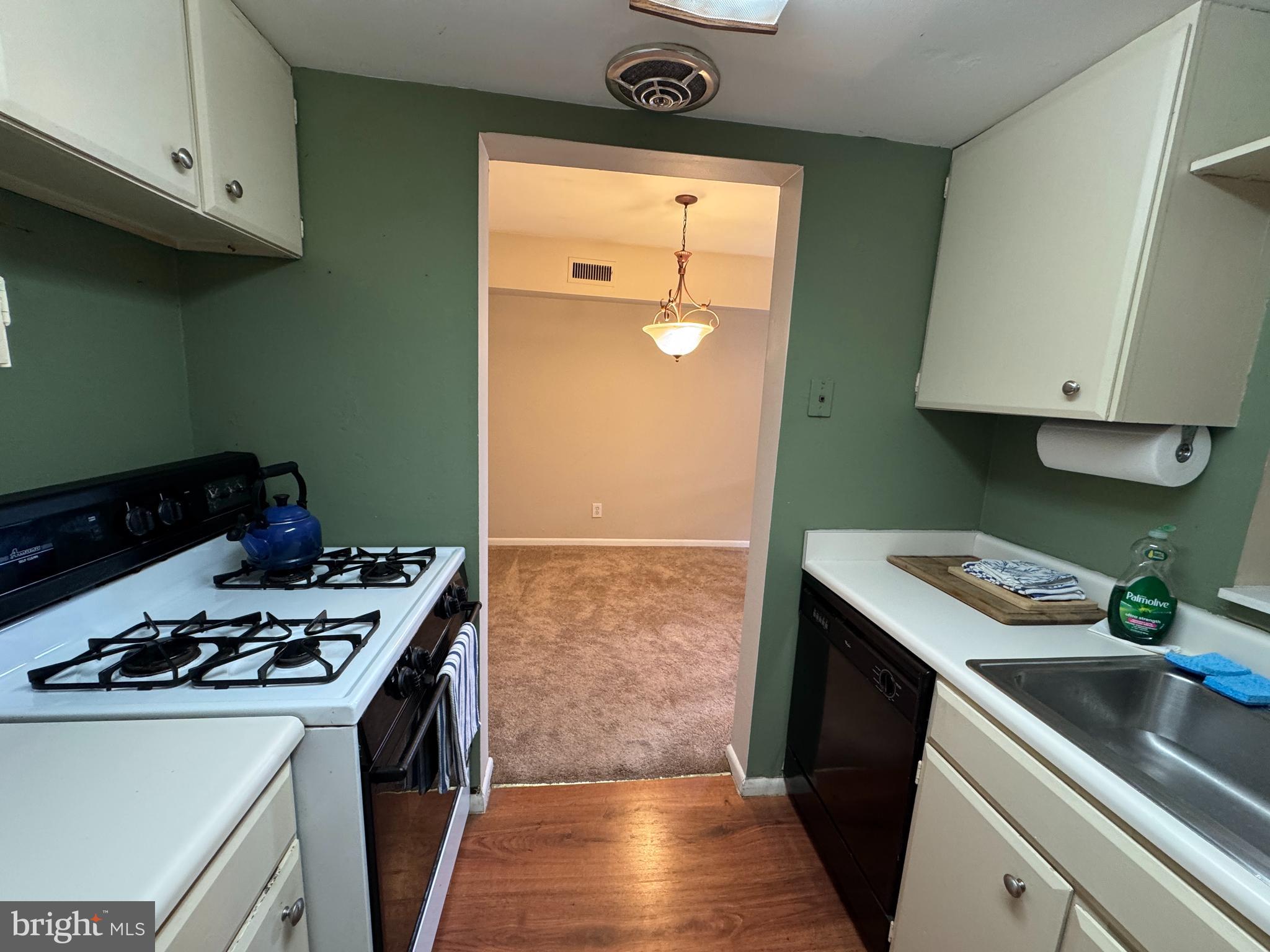 307 Drummers Lane Wayne, PA 19087 - Photo 6 of 16 a kitchen with a stove and a refrigerator