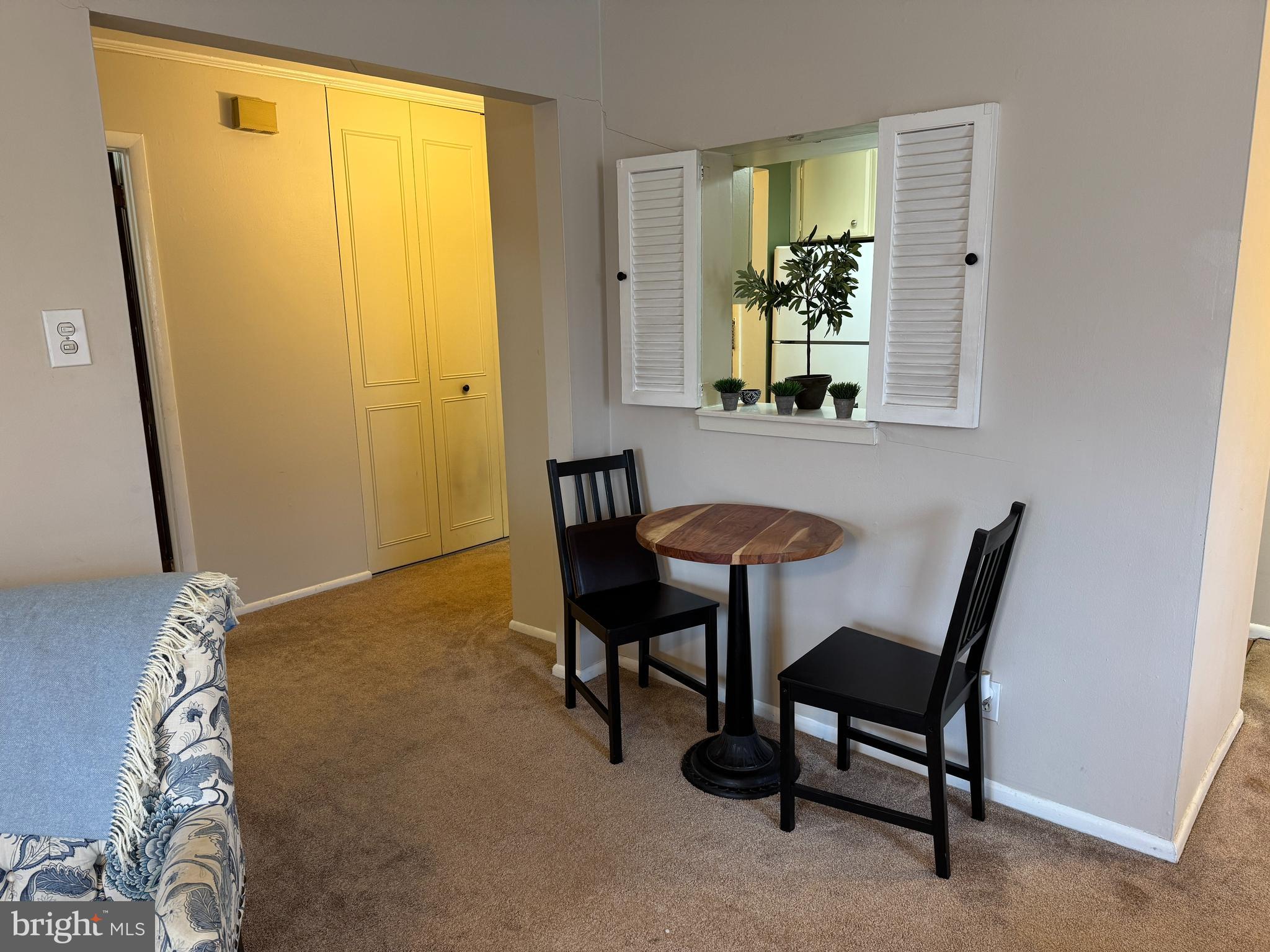 307 Drummers Lane Wayne, PA 19087 - Photo 8 of 16 a view of a dining room with furniture and a window