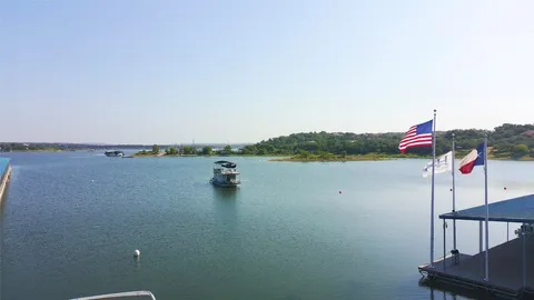 an aerial view of a house with a lake view