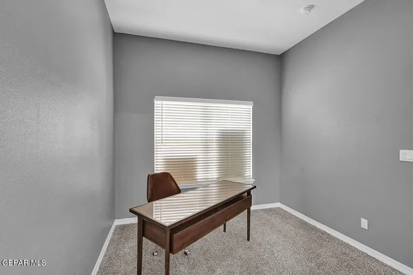 a view of a workspace with a window