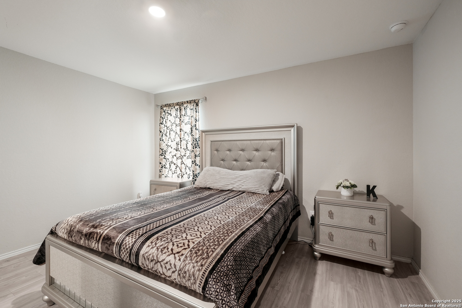 706 Ambush Ridge San Antonio, TX 78220 - Photo 12 of 21 a bedroom with a bed and a window