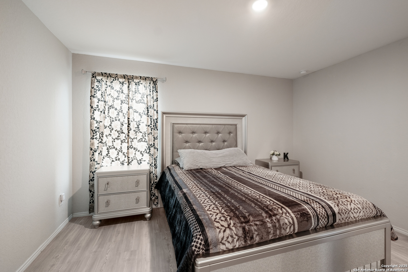 706 Ambush Ridge San Antonio, TX 78220 - Photo 13 of 21 a bedroom with a bed and a window