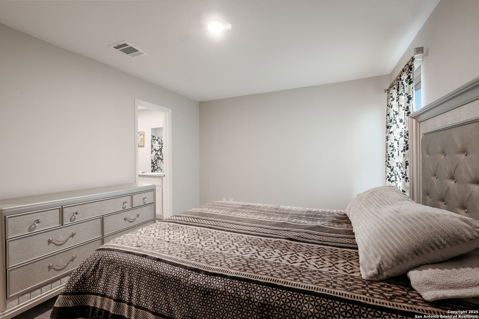 706 Ambush Ridge San Antonio, TX 78220 - Photo 14 of 21 a bedroom with a bed and a window