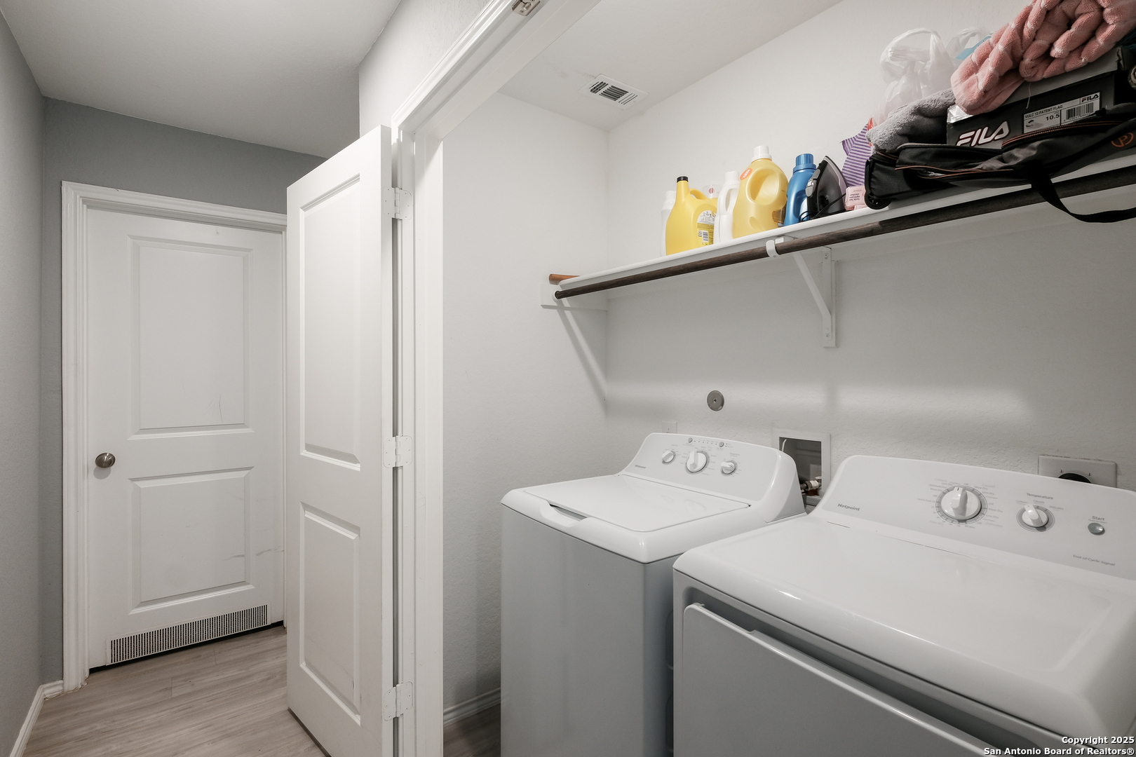 706 Ambush Ridge San Antonio, TX 78220 - Photo 20 of 21 a utility room with dryer and washer