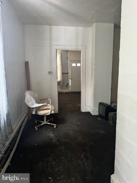 300 3rd Street Monessen, PA 15062 - Photo 2 of 14 a living room with a table chairs and a potted plant