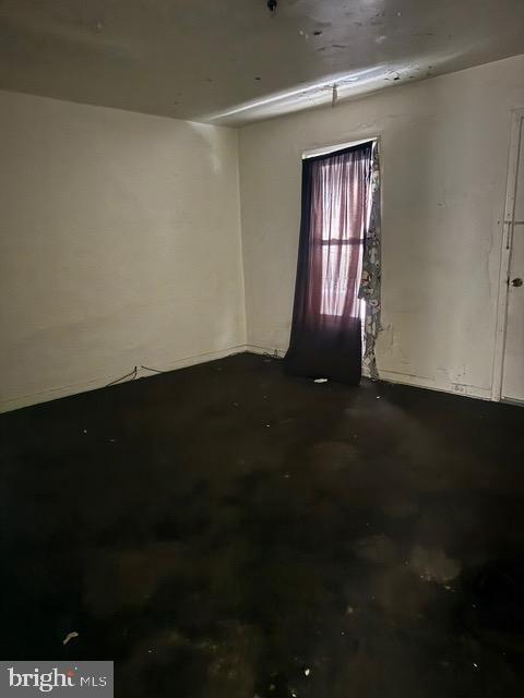 300 3rd Street Monessen, PA 15062 - Photo 8 of 14 a view of an empty room with wooden floor and a window