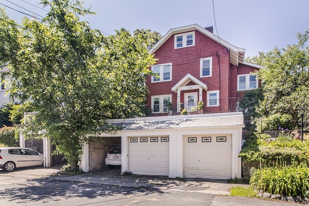 15 Sunset Road, Unit 15 Watertown, MA 02472 - Photo 1 of 25 a front view of a house with a yard