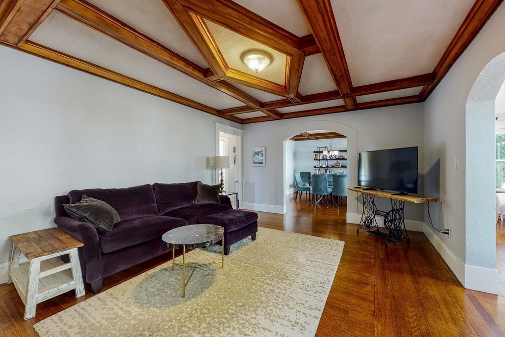 15 Sunset Road, Unit 15 Watertown, MA 02472 - Photo 12 of 25 a living room with furniture and a flat screen tv