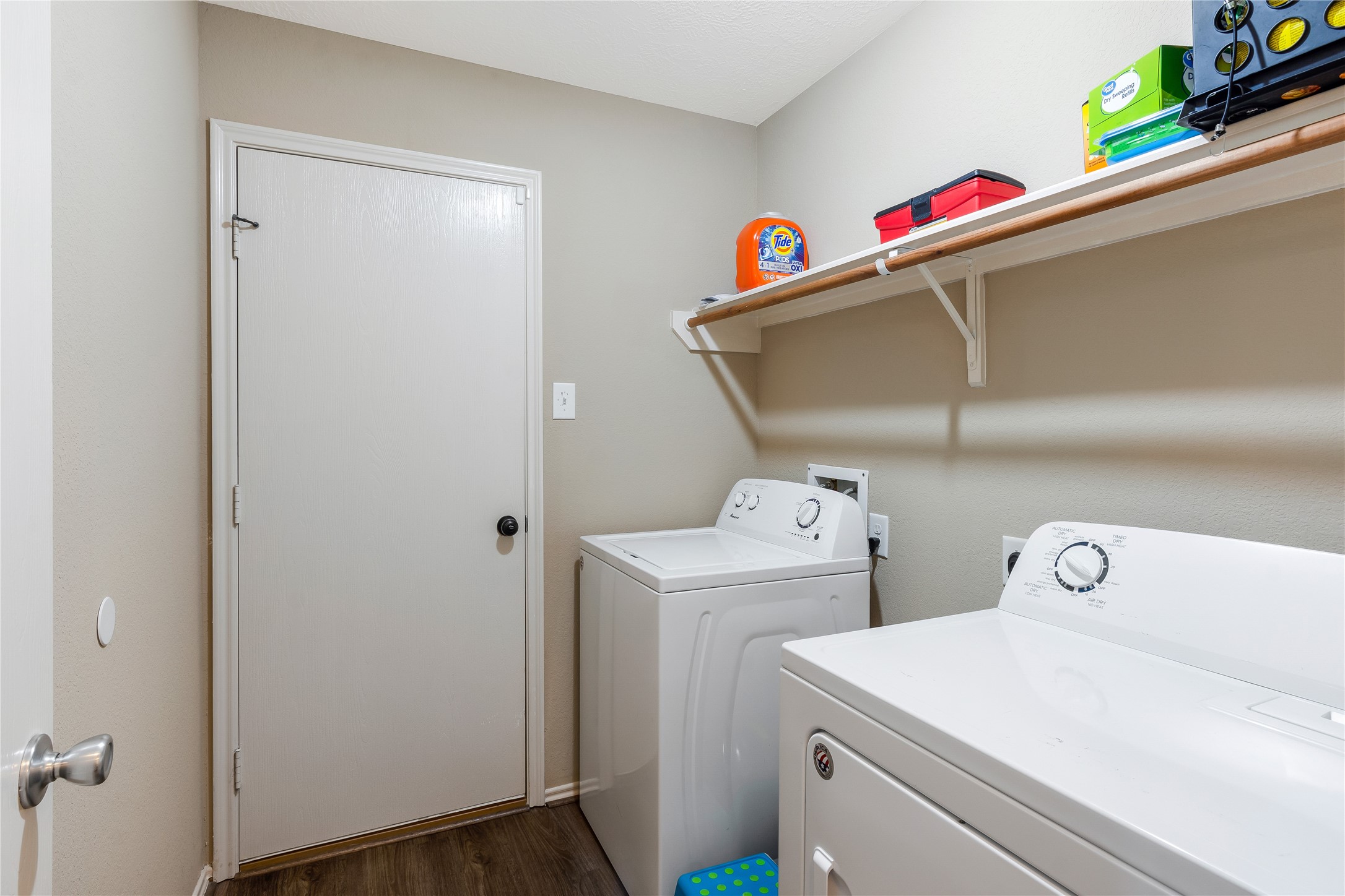 16306 Rustic Stable Lane Cypress, TX 77429 - Photo 25 of 32 The laundry room leads out to the garage!