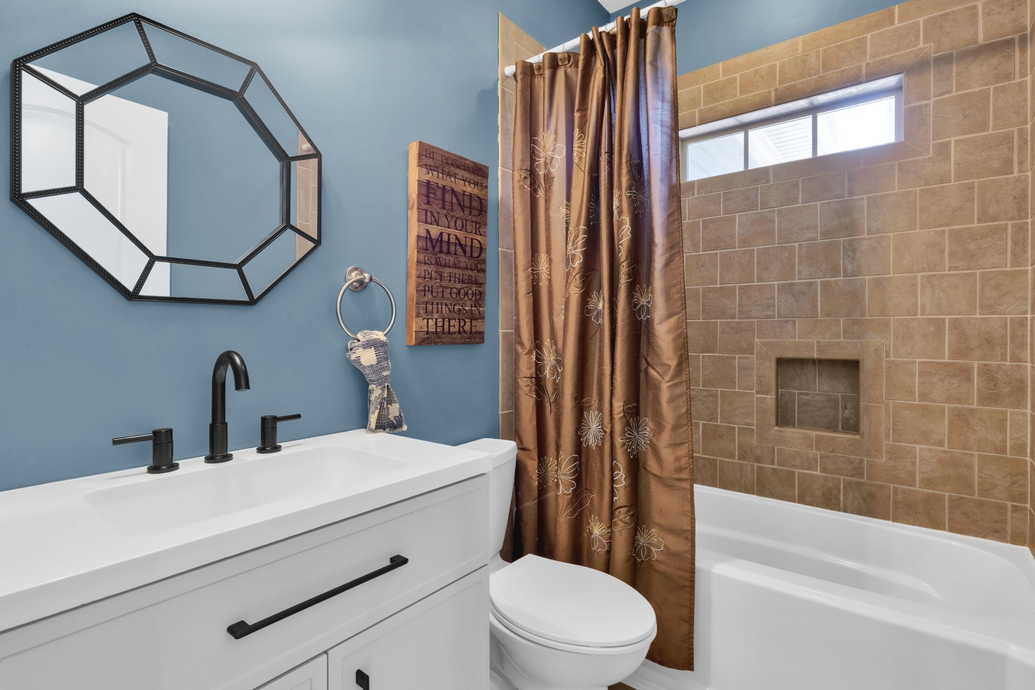 3988 Fykes Grove Road Cedar Hill, TN 37032 - Photo 30 of 50 a bathroom with a toilet a sink and bathtub