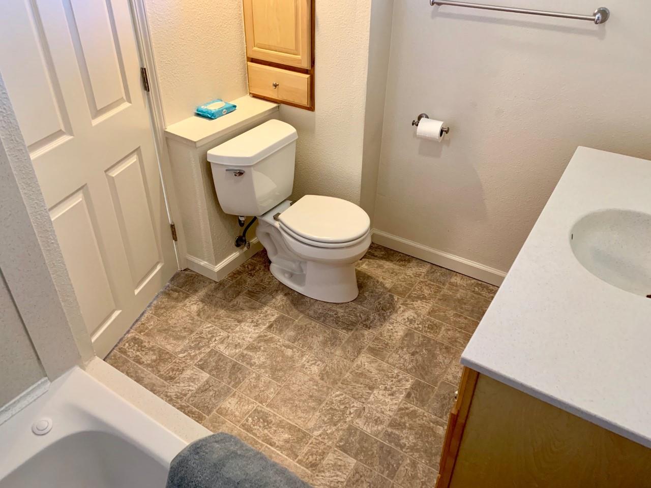 815 Edgemar Avenue Pacifica, CA 94044 - Photo 26 of 27 a bathroom with a sink and a toilet