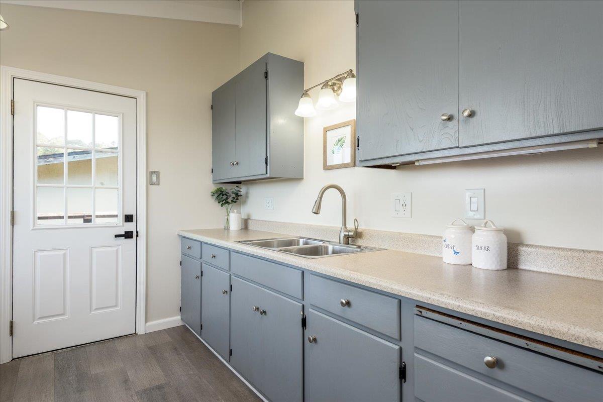 815 Edgemar Avenue Pacifica, CA 94044 - Photo 7 of 27 a kitchen with sink and cabinets