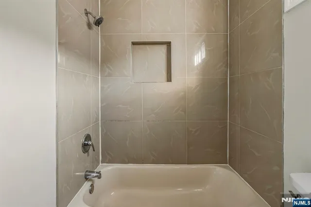 a bathroom with a bathtub