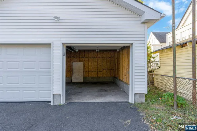 a front view of a house with a garage