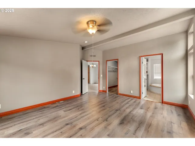 a view of balcony with wooden floor