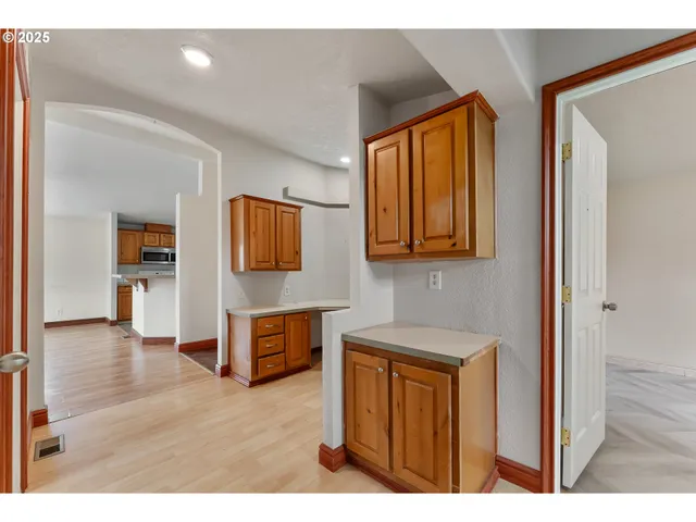 a view of kitchen with wooden floor