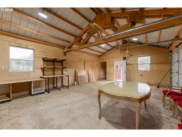 a bathroom with a sink mirror vanity and toilet