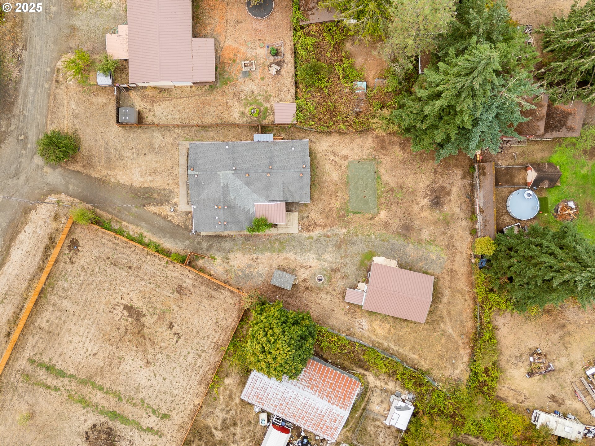 161 South Avenue Sutherlin, OR 97479 - Photo 40 of 45 an aerial view of residential house with pool and trees