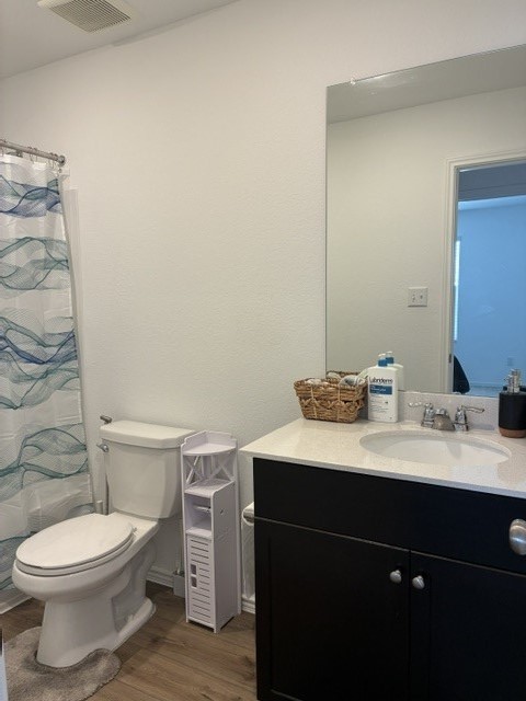 233 Perfect World Loop Jarrell, TX 76537 - Photo 13 of 24 A compact bathroom with durable flooring and a practical vanity.