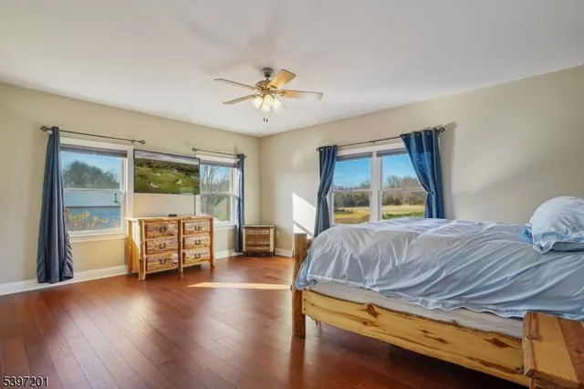 a room with a bed and a chandelier