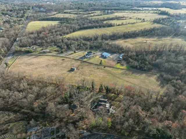 a view of a patio with chair and tables