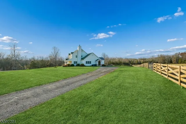 a view of pool with yard