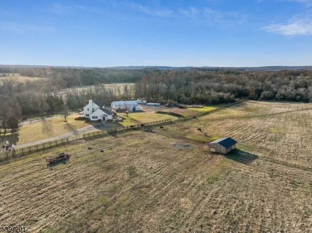 a view of a two chairs in the balcony