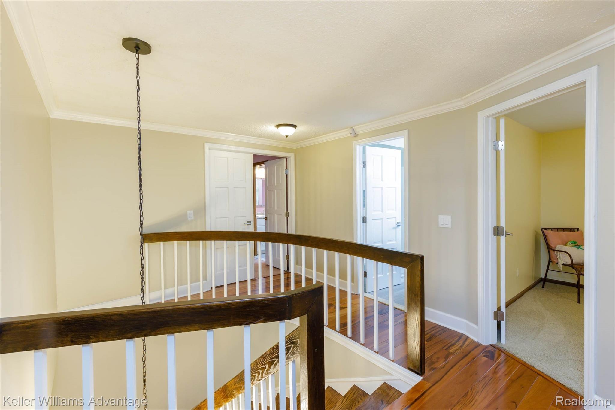 25325 Rutledge Crossing Farmington, MI 48335 - Photo 20 of 56 Brazilian Koa Hardwood Floors t/o Landing & Hallway