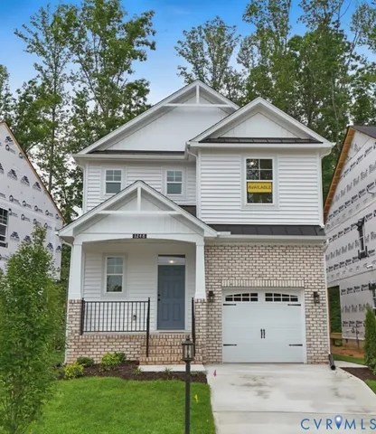 a view of a yard in front view of a house