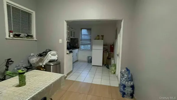 a kitchen with a sink and a stove top oven