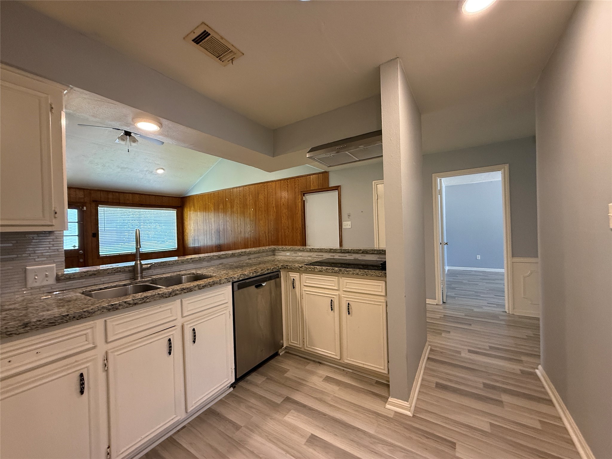422 Gamewood Drive Spring, TX 77386 - Photo 14 of 25 a kitchen with granite countertop a sink and cabinets