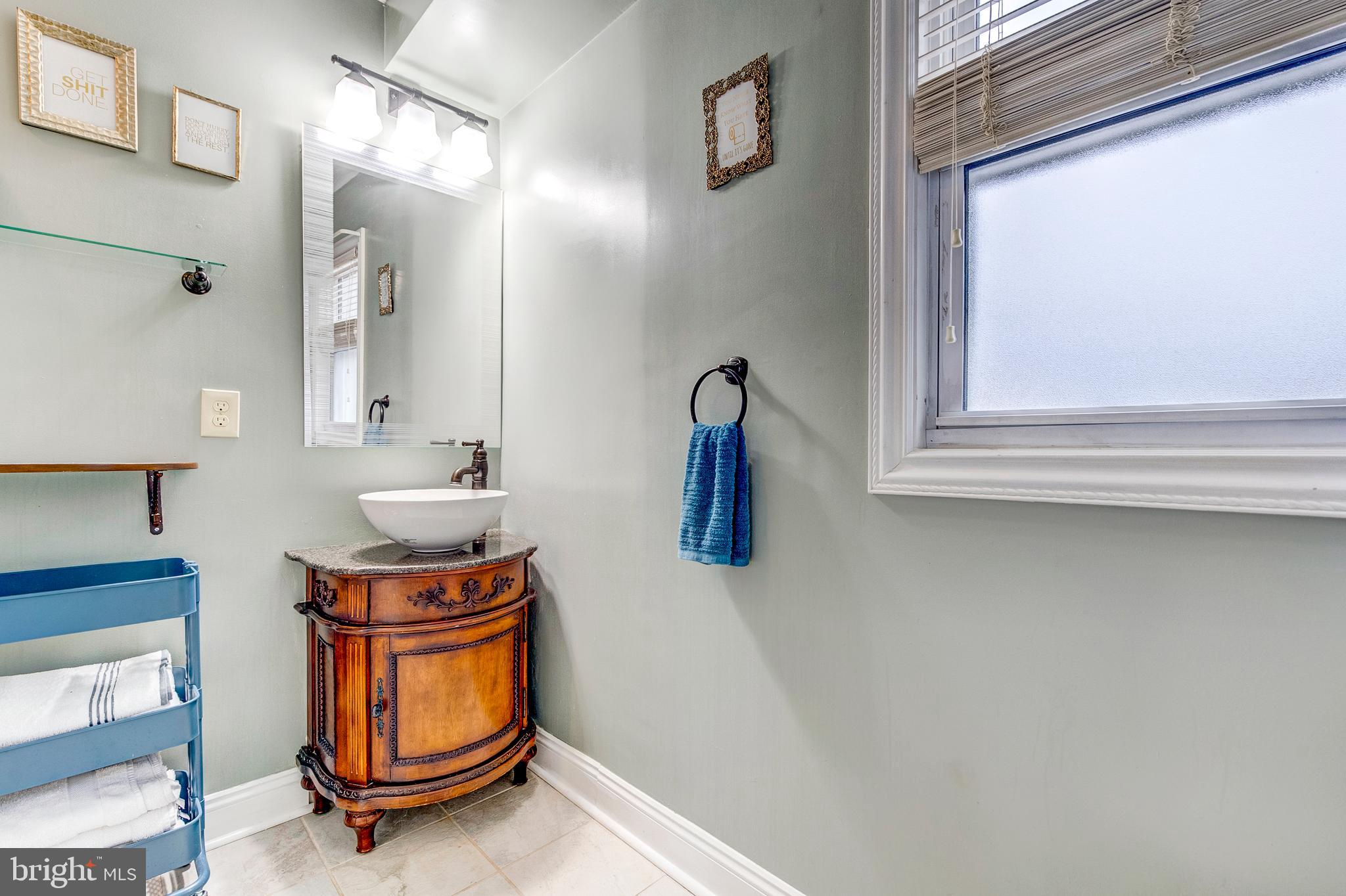824 Martin Road Baltimore, MD 21221 - Photo 14 of 36 En-suite in master bedroom has vessel sink