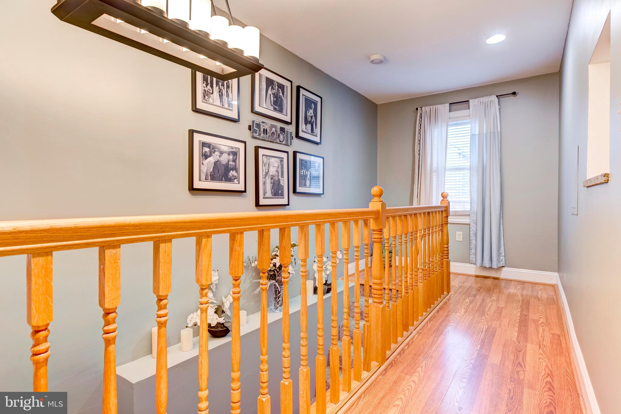 824 Martin Road Baltimore, MD 21221 - Photo 23 of 36 Bright hallway leading to lower level
