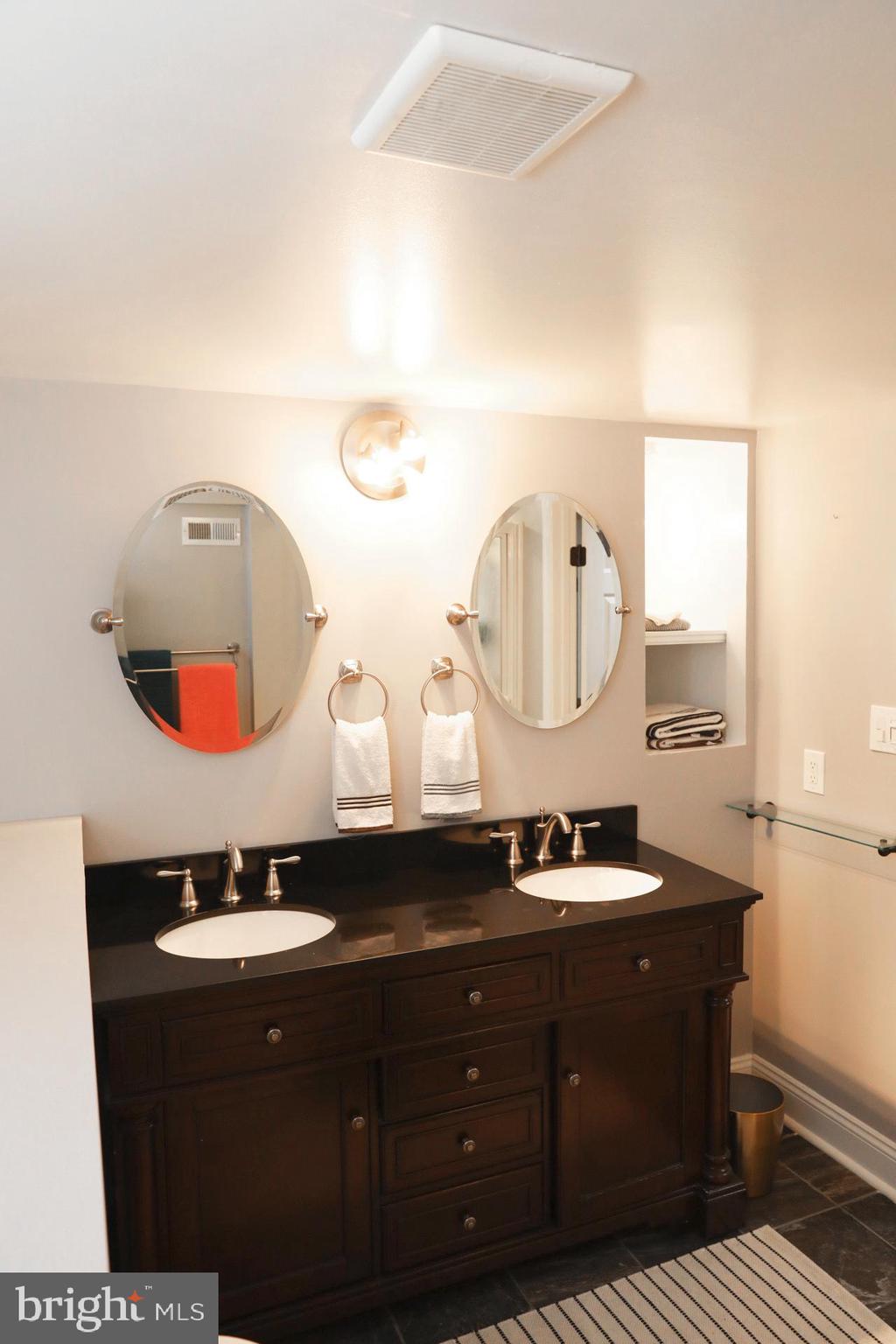824 Martin Road Baltimore, MD 21221 - Photo 26 of 36 Lower level full bath with double vanity