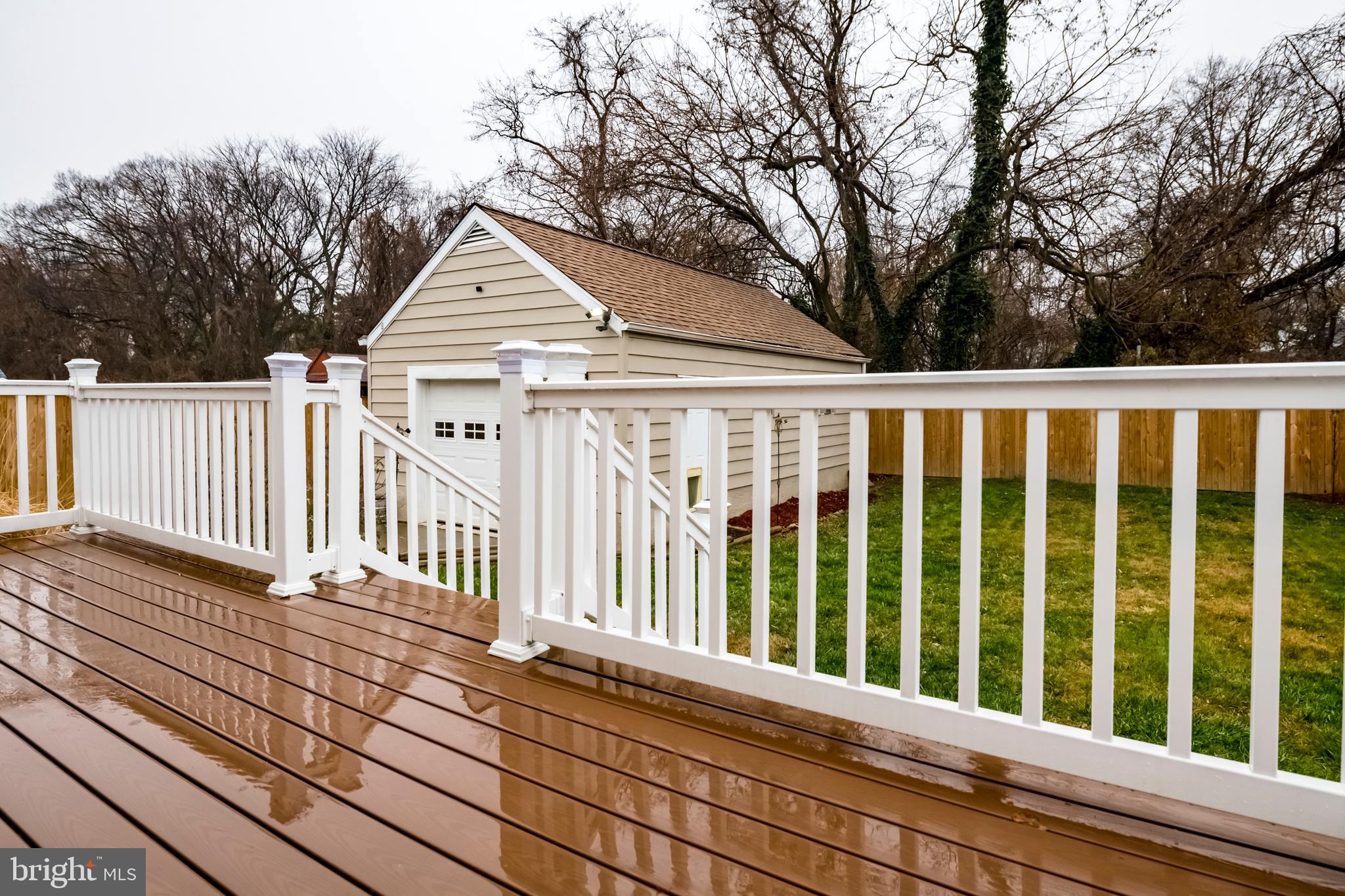 824 Martin Road Baltimore, MD 21221 - Photo 29 of 36 Maintenance-free deck leads to level fenced yard