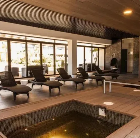 a living room with large windows