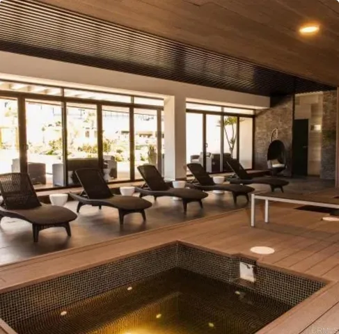 a living room with large windows